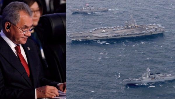 Russian Defense Minister Sergei Shoigu and the U.S. Navy's aircraft carrier USS Ronald Reagan and the destroyer USS Stethem alongside ships from the Republic of Korea Navy in the waters east of the Korean Peninsula on October 18, 2017 (R)