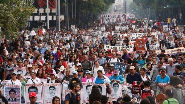 People take to the streets demanding justice for the 43 disappeared students of Ayotzinapa on Oct. 26, 2017 in Mexico City.