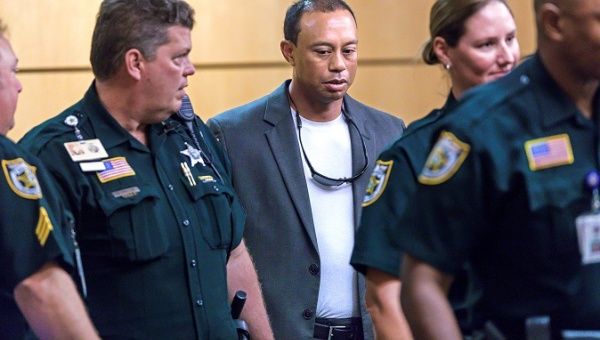 Tiger Woods appears in Palm Beach County Court, where he pleaded guilty to a charge of reckless driving.