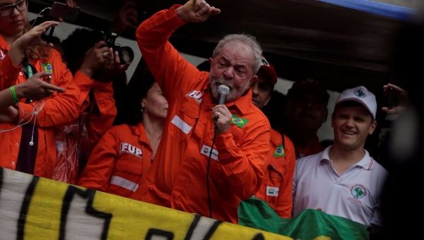 Former Brazil's President Luiz Inacio Lula da Silva, speaks outside the headquarters of Brazil's state-run Petrobras oil company, during a protest against the privatisation of state owned companies in Rio de Janeiro, Brazil, Oct. 3, 2017.