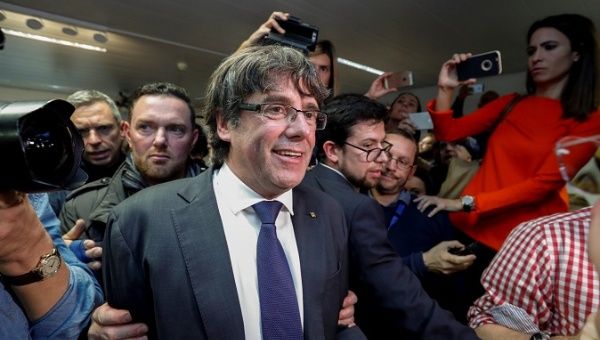 Catalan leader Carles Puigdemont departs after giving a news conference at the Press Club Brussels Europe in Brussels, Belgium, Oct. 31, 2017.
