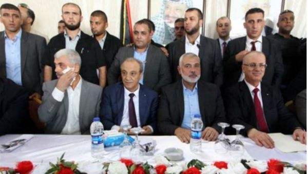 Senior Palestinian officials from Hamas and Fatah.