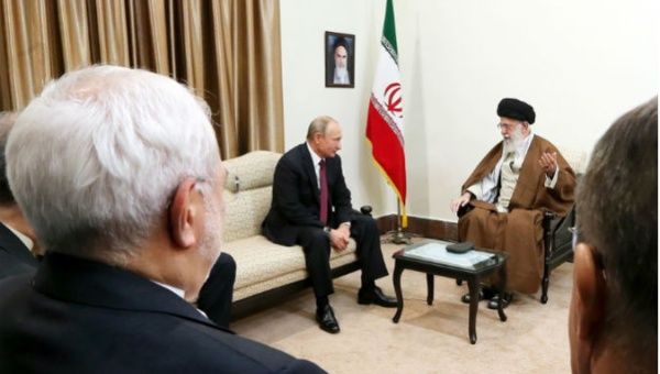 Russian President Vladimir Putin (L), meets with Irans Supreme Leader Ayatollah Seyyed Ali Khamenei.