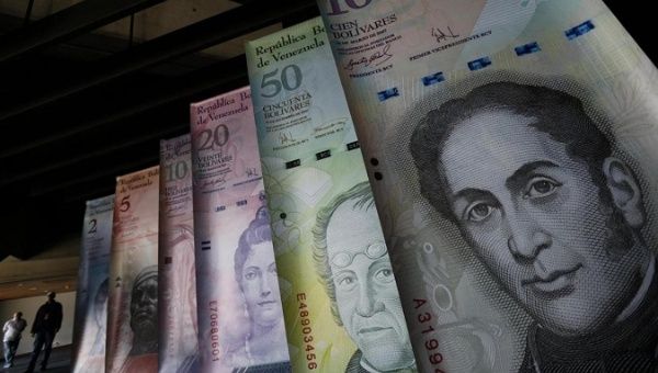 Samples of Venezuela's currencies are displayed at the Central Bank building in Caracas.
