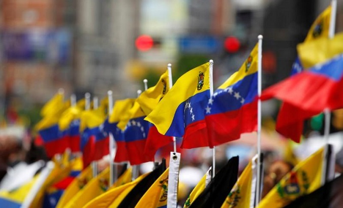 Venezuelan flags are seen during a rally in Caracas, Venezuela.