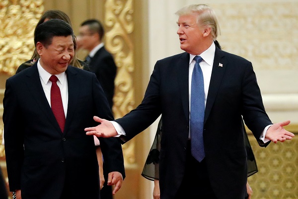U.S. President Donald Trump and China's President Xi Jinping arrive for a state dinner at the Great Hall of the People in Beijing.