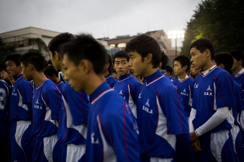 Students attend a football training session at Korean High in Tokyo.