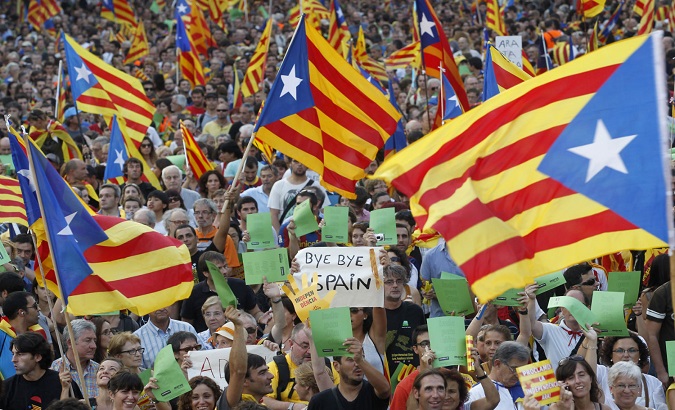 Catalans in the streets demand independence from Spain.