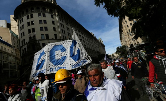 Union workers march during a demonstration against Argentine President Mauricio Macri's administration in Buenos Aires, Aug. 22, 2017.