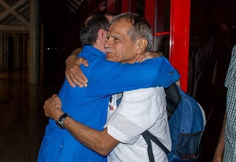 Lopez Rivera was greeted and hugged at the airport by Fernando Gonzalez Llort, one of the Cuban 5, who for over four years shared a prison cell with Lopez Rivera in the United States.