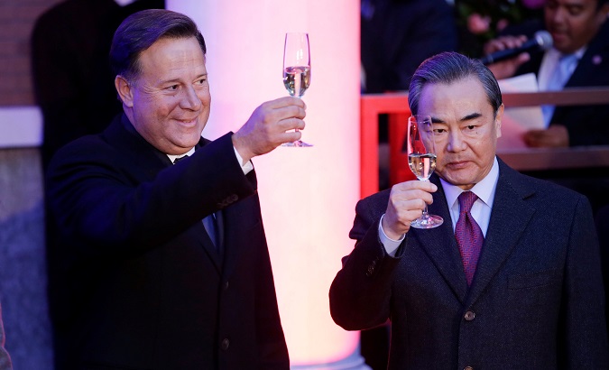 Panama’s President Juan Carlos Varela and China's Foreign Minister Wang Yi attend the inauguration of the Panama embassy in Beijing.