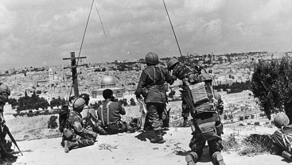 Israeli soldiers observe the compound known to Muslims as the Noble Sanctuary and to Jews as the Temple Mount, just prior to their attack on Jerusalem’s Old City, during the 1967 war.