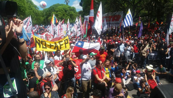 Protesters march against neoliberalism in Montevideo, Uruguay.