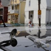 A syringe filled a narcotic, an empty syringe and a spoon sit on the roof of a car, where a man in his 20's overdosed on opioids in Lynn, Massachusetts, U.S., August 14, 2017. 