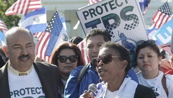 Honduran TPS recipient Martha Connor joins a rally in solidarity with Salvadoran TPS recipients in Washington, D.C.