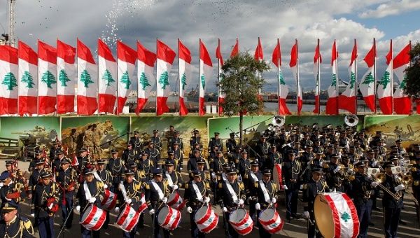 Lebanese band members take part in a military parade to celebrate the 74th anniversary of Lebanon's independence in downtown Beirut.