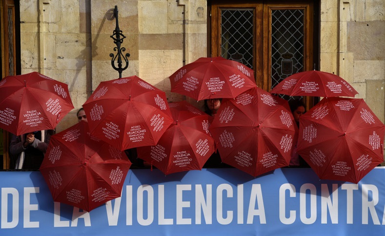 People display red umbrellas to commemorate the victims of gender violence during the UN International Day for the Elimination of Violence against Women rally in Oviedo, northern Spain.