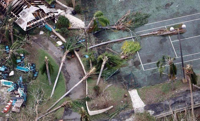 Toppled trees lie on a tennis court after Hurricane Maria battered St. Croix, U.S. Virgin Islands.