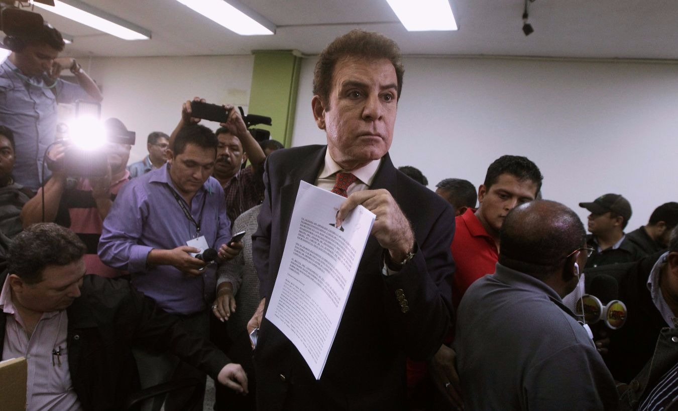 Salvador Nasralla, presidential candidate for the Opposition Alliance Against the Dictatorship, hold a document after formally requesting to annul the results of the still-unresolved presidential election, in Tegucigalpa, Honduras, early December 9, 2017.