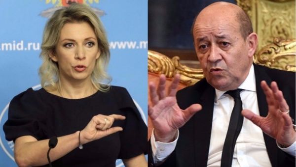Russian Foreign Ministry Spokeswoman Maria Zakharova (L) and French Foreign Minister Jean-Yves Le Drian (R)