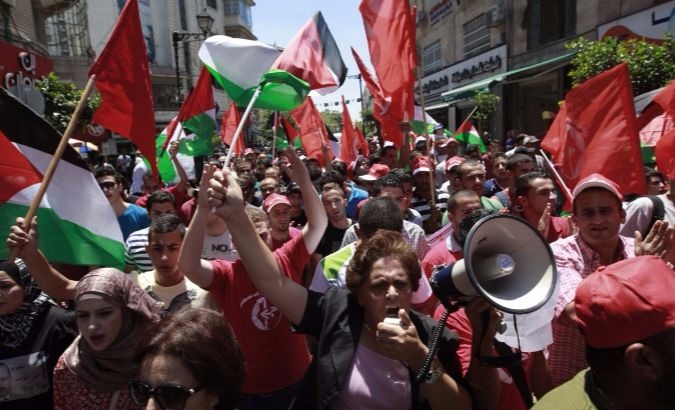 PFLP Activists march in Palestine.
