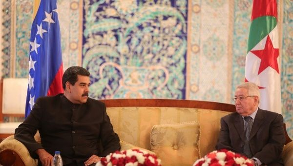 Venezuela's President Nicolas Maduro (L) meets with Algeria's Senate President Abdelkader Bensalah in Algiers, Algeria December 12, 2017.