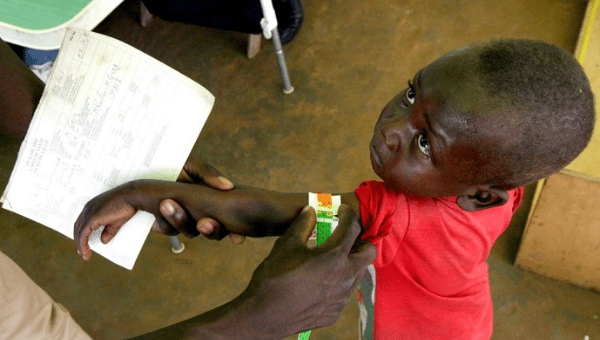  A Congolese boy has his arm measured for malnutrition in a clinic, March 18, 2006. 