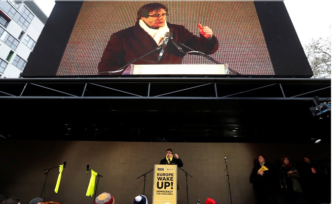 Ousted Catalan leader Carles Puigdemont speaks as he takes part in a pro-independence rally for Catalonia, in Brussels, Belgium December 7, 2017
