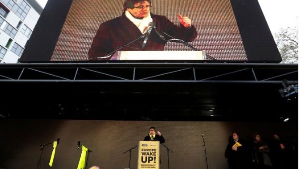 Ousted Catalan leader Carles Puigdemont speaks as he takes part in a pro-independence rally for Catalonia, in Brussels, Belgium December 7, 2017