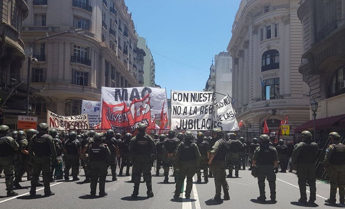 Workers and activists take to the streets of Buenos Aires against labor and pension reforms