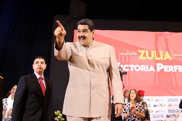 Venezuela's President Nicolas Maduro arrives for the swearing in of newly elected governor of Zuila state, Omar Prieto, in Maracaibo, December 16.