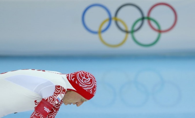 Ivan Skobrev of Russia reacts after his men's 5000 meters speed skating race during the 2014 Sochi Winter Olympics, February 8, 2014