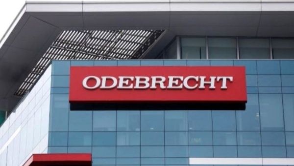 A sign displaying the logo of the Odebrecht SA construction conglomerate is pictured in Lima, Peru.