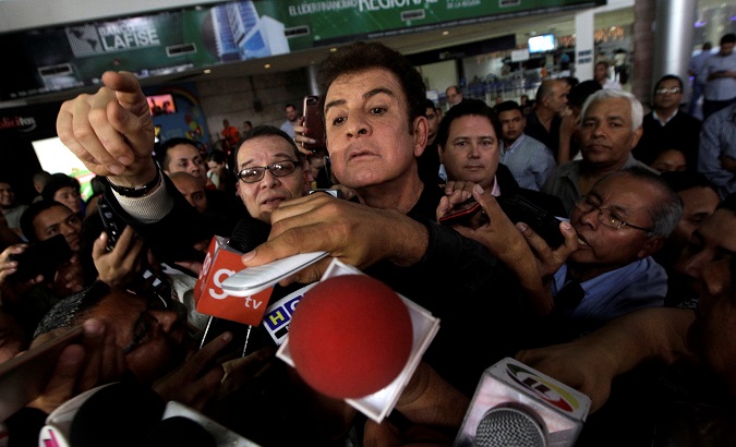 Honduran opposition candidate Salvador Nasralla addresses the media during his arrival at Toncontin airport after visiting the U.S., in Tegucigalpa, Honduras December 20, 2017
