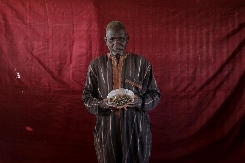 Abdulwahal Abdulla, a 50-year-old living in Bakasi for three years, hoped to trade his bowl of young tilapia worth roughly 150 naira for cooking oil. Abdulla, no fan of the fish, had bought them because products were scarce and it was the only thing he could buy at the time, he said.