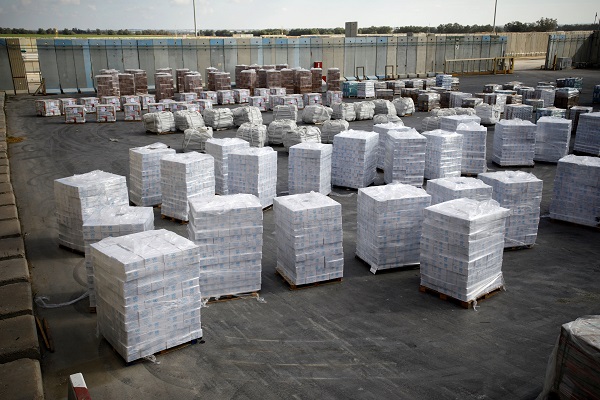 Boxes containing aid from the United NAtions Relief and Works Agency (UNRWA) ahead of their transfer to the Gaza Strip.