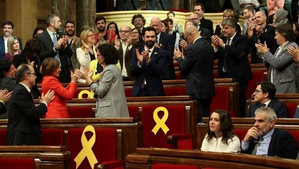 Deputy Torrent is congratulated after being elected as new Speaker during the first session of Catalan Parliament after the regional elections in Barcelona.
