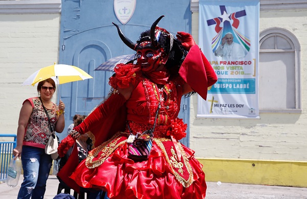 A dancer from the Diablada group performs a day before the arrival of Pope Francis in Iquique, Chile, January 17.