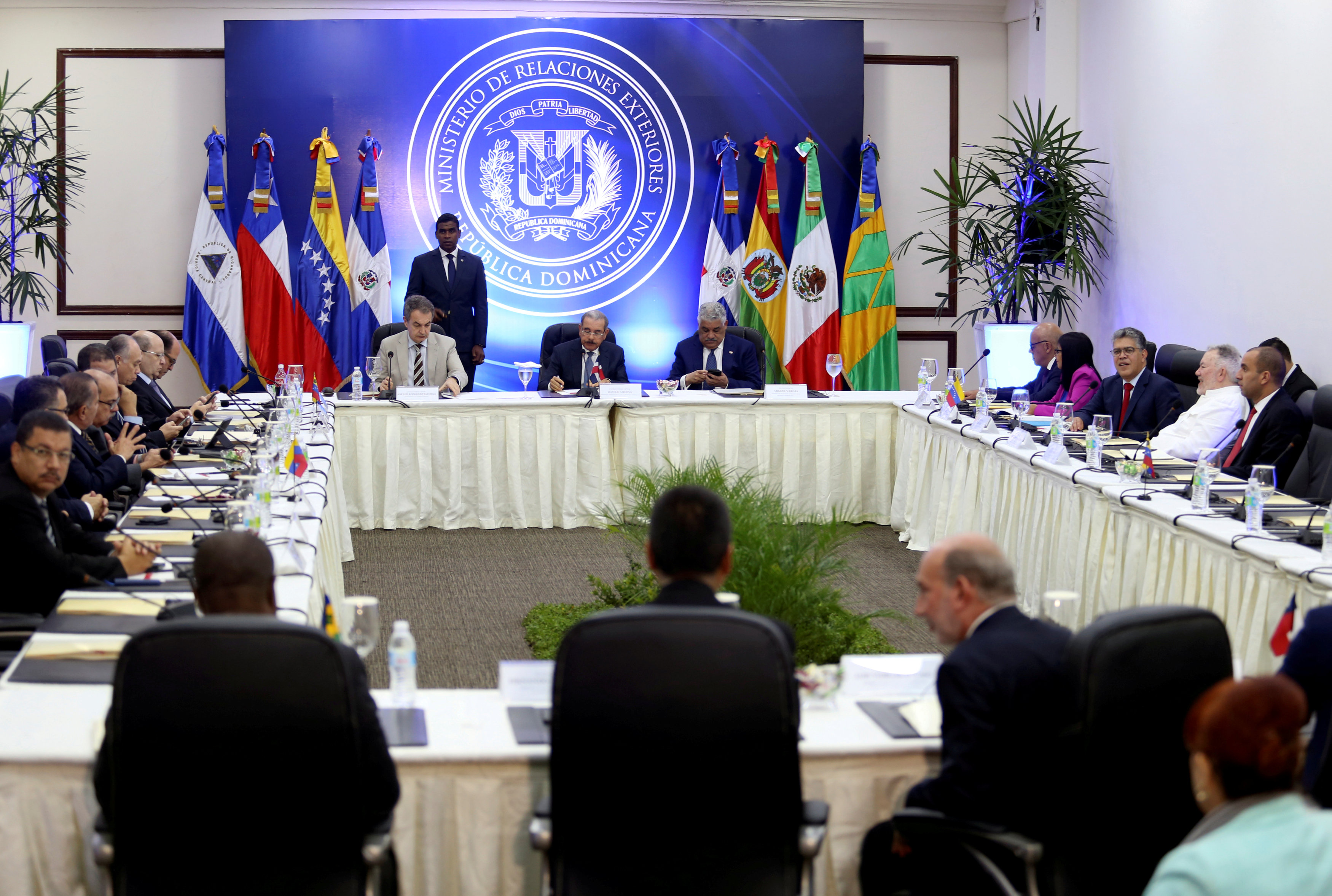 Delegates of President Nicolas Maduro's government and Venezuela's opposition coalition meet for a round of talks in Santo Domingo, Dominican Republic January 12, 2018.