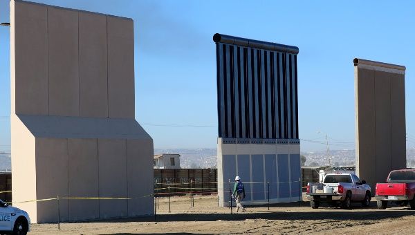 Three of US President Donald Trump's eight border-wall prototypes near completion along the US- Mexico border in San Diego, California, October 2017.