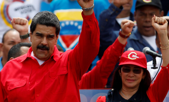 Venezuelan President Nicolas Maduro (L) and his wife Cilia Flores (R).