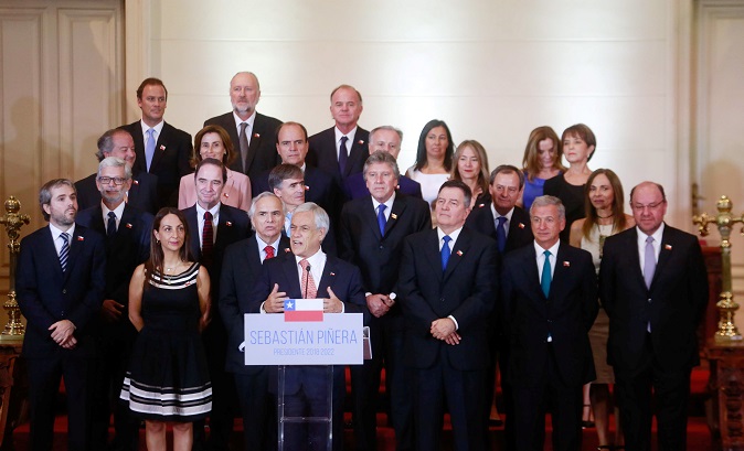 Chilean President-elect Sebastian Pinera, delivers a speech next to his ministers during the presentation of his presidential cabinet.