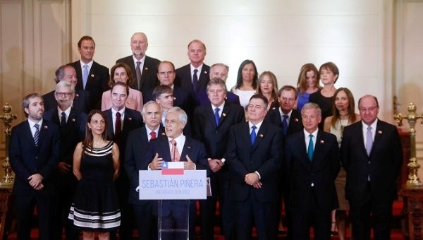 Chilean President-elect Sebastian Pinera, delivers a speech next to his ministers during the presentation of his presidential cabinet.