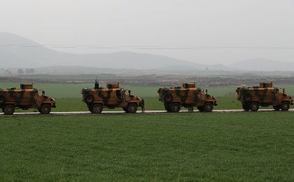 Turkish army vehicles are pictured near the Turkish-Syrian border in Hatay province, Turkey January 23, 2018.