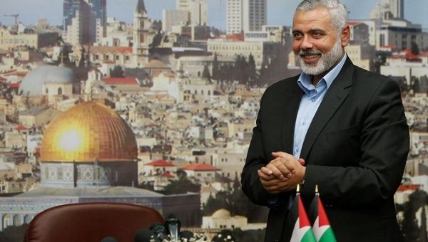 Hamas leader Ismail Haniyeh gestures before delivering a speech in Gaza City.