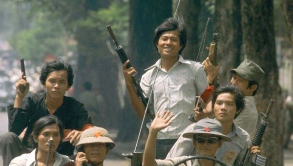 Vietcong soldiers celebrate in the streets of Saigon.