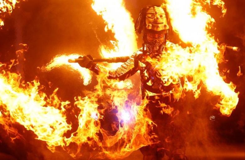A Korean artist aflame in the spirit of Asiatic pride performs an incendiary artistic piece for the Olympic games.
