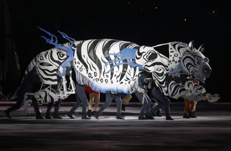 South Korea added an Asian twist to their customary parades prior to beginning the international sporting event.