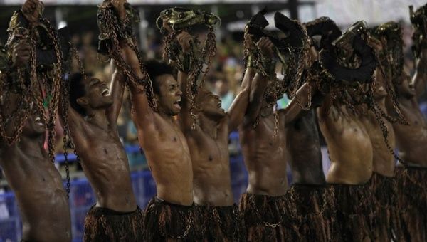 Revellers from Paraiso do Tuiuti Samba school perform during the first night of the Carnival parade at the Sambadrome in Rio de Janeiro, Brazil Feb. 12, 2018.