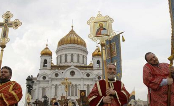 Members of the Orthodox clergy walk in procession after a call to prayer in support of the Orthodox Church at the Christ the Saviour Cathedral in Moscow April 22, 2012.